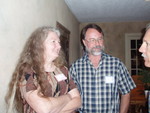 Norma Mathews Fender with husband Larry chatting with Rick Hindman