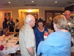 Anne Macey looking very entertained while conversing with Gary and Valerie Mefferd.  That's Ken and Trish Polk Bright in the background and Bill Russ on the right