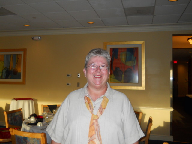 Reunion commitee member Sharon Willis pauses for a pic before the Saturday dinner