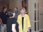 Shelly Knight Eisner speaking with Terry Banks PIcard; Jim Kersey and Ken Bright in background