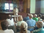Rev. Herman Haynes officiates at the Sunday Service